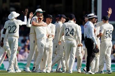 England's Joe Root (third left) celebrates taking the wicket of Australia's Mitchell Marsh during day four of the fifth test match at The Kia Oval, London. PA Photo. Picture date: Sunday September 15, 2019. See PA story CRICKET England. Photo credit should read: John Walton/PA Wire. RESTRICTIONS: Editorial use only. No commercial use without prior written consent of the ECB. Still image use only. No moving images to emulate broadcast. No removing or obscuring of sponsor logos.