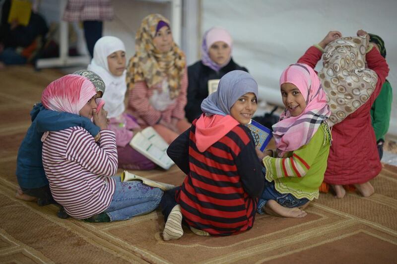 From today, the Big Heart Campaign is to provide education for the children in refugee camps, such as these girls in Zaatari. Jeff J Mitchell / Getty Images