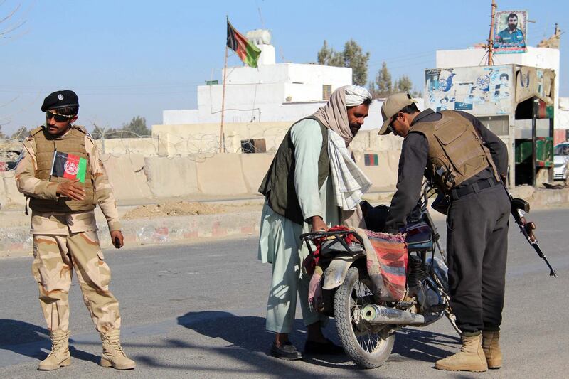 epa07315720 Afghan security officials check people and vehicles at a checkpoint in Helmand, Afghanistan, 24 January 2019. Since the end of the NATO combat mission in Afghanistan in 2015, the Afghan government has steadily lost territory to the Taliban and currently controls just 56 percent of the country, according to the United States Special Inspector General for Afghanistan Reconstruction.  EPA/WATAN YAR