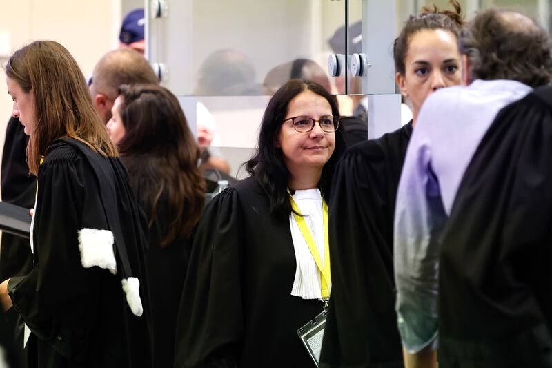 One of Salah Abdeslam's lawyers, Delphine Paci, centre, during the last day of the trial over the Brussels attacks. AP