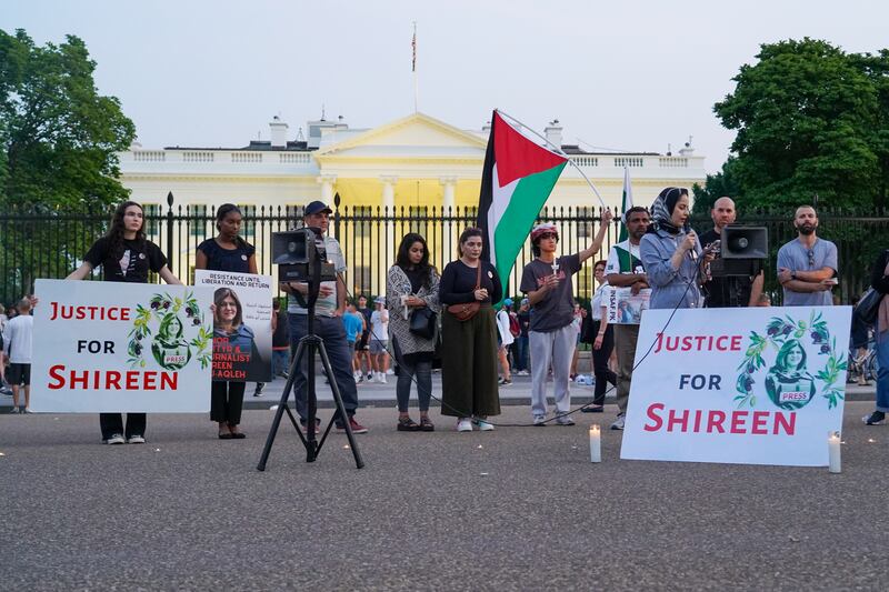 Laila Al Arian speaks outside the White House at a candlelight vigil for Palestinian journalist Shireen Abu Akleh. Willy Lowry / The National