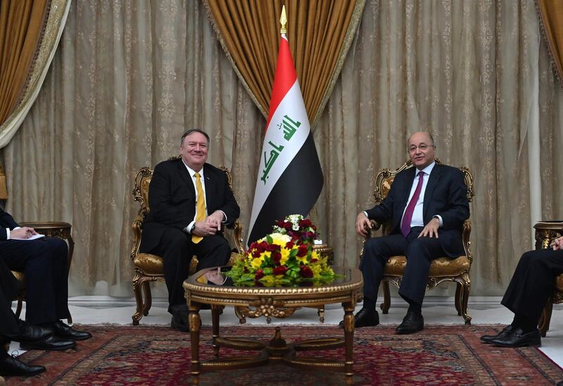 Mr Pompeo with Iraq's President Barham Saleh. AFP Photo