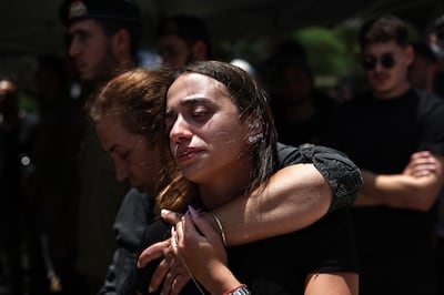 Mourners during the funeral of Israeli soldier Elay Elisha Lugasi in Kirat Shmona, near the Israeli-Lebanon border on July 4, 2024. EPA 