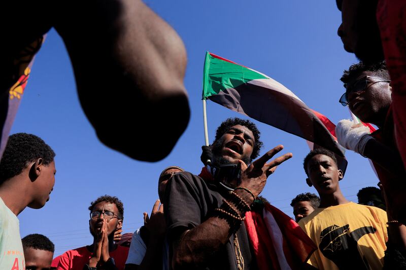 People attend a march during a protest against military rule following last month's coup in Khartoum. Reuters