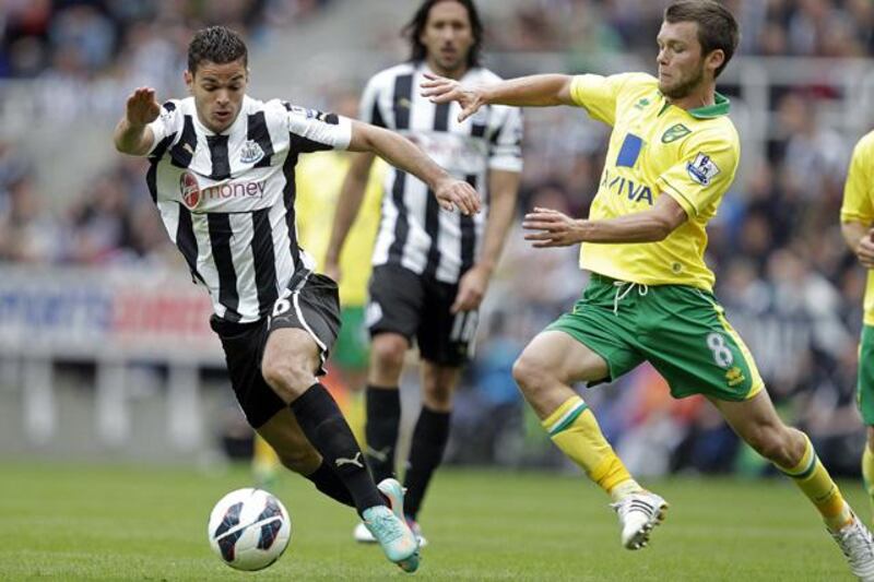 Newcastle United's French midfielder Hatem Ben Arfa (L) vies with Norwich City's English midfielder Jonathan Howson (R) during the English Premier League football match between Newcastle United and Norwich City at Sports Direct Arena in Newcastle, north-east England on September 23, 2012. AFP PHOTO/GRAHAM STUART



RESTRICTED TO EDITORIAL USE. No use with unauthorized audio, video, data, fixture lists, club/league logos or ÒliveÓ services. Online in-match use limited to 45 images, no video emulation. No use in betting, games or single club/league/player publications


