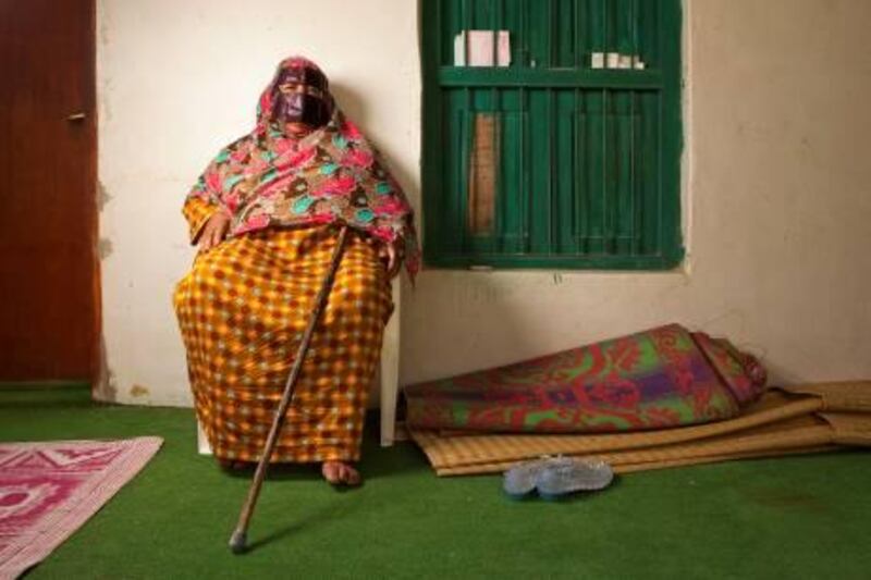 November 29. Aisha Al Dabdoob, 74, is a traditional medicine woman in Ras Al Khaimah. She has a talent famous among her patients to cure people with her songs. November 29, Ras Al Khaimah, United Arab Emirates (Photo: Antonie Robertson/The National)