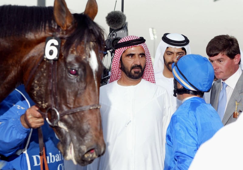 Sheikh Mohammed bin Rashid congratulates Frankie Dettori after a winner at the 2002 Dubai World Cup night. AFP