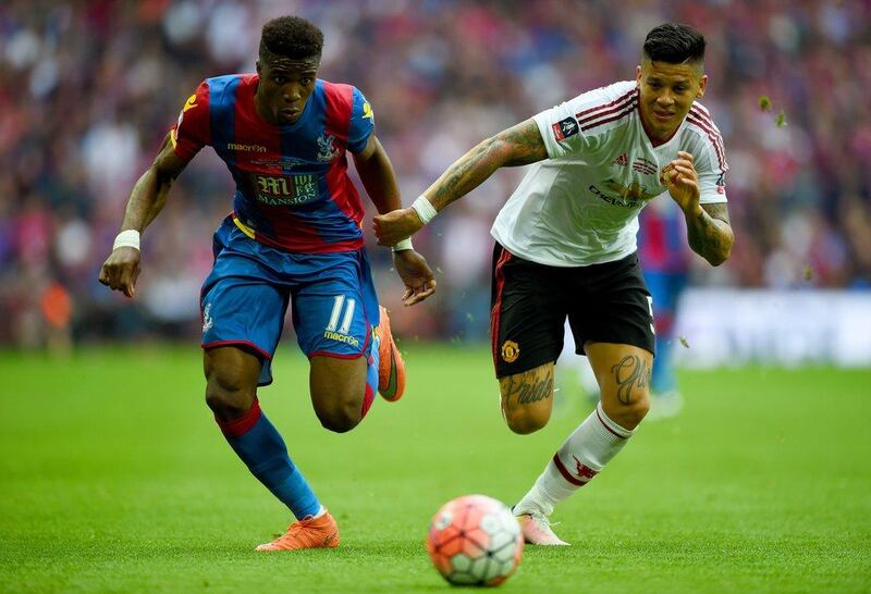 Wilfried Zaha of Crystal Palace battles with Marcos Rojo of Manchester United during the FA Cup Final match between Manchester United and Crystal Palace at Wembley Stadium on May 21, 2016 in London, England. (Shaun Botterill/Getty Images)