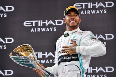 Lewis Hamilton, pictured celebrating victory in the 2019 Abu Dhabi Grand Prix, is looking to win a record-equalling seventh world crown. AFP