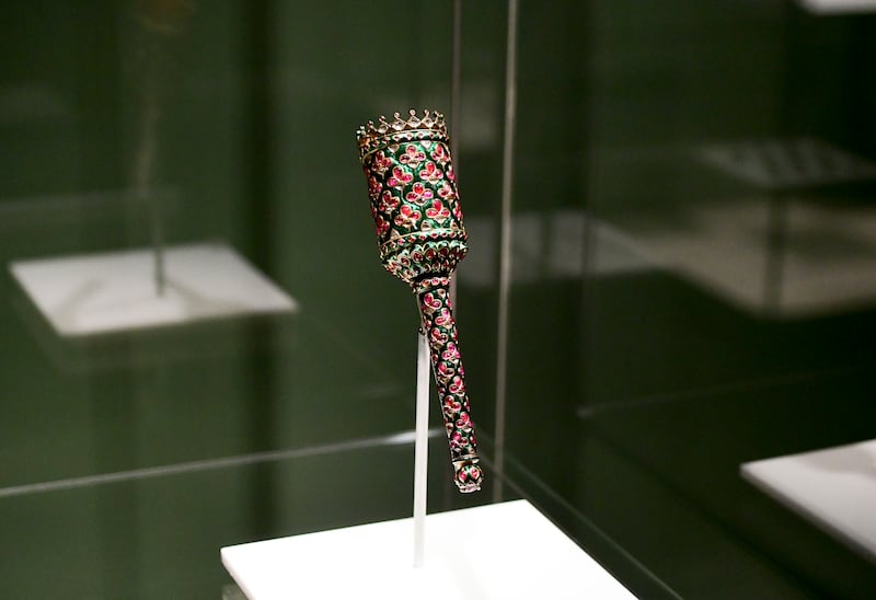 A flywhisk handle set with diamonds and rubies 
