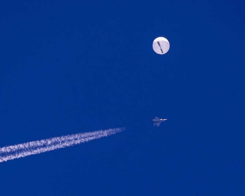 A US fighter jet approaches the large balloon off the coast of South Carolina. AP