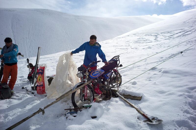 AFGHANISTAN, Bamiyan: 04 March 2021
Pictures from the annual Afghan Mountain Challenge - a ski event held in Bamiyan Province, 80 miles west of Kabul. Participants have to run up the mountain via specific checkpoints and then proceed to ski down. 
Pictured - The motorbike they use for the rope tow to pull skiers up the hill. Rick Findler for The National