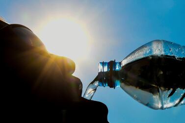 The UAE Water Aid Foundation has pledged a bottle of water to go along with each of 10 millon meals to be distributed to needy families during Ramadan. Courtesy: AFP    