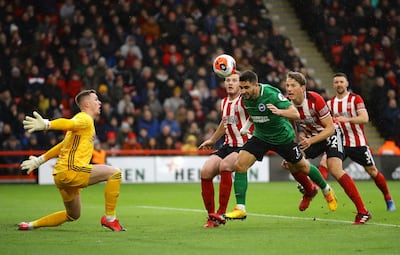 SHEFFIELD, ENGLAND - FEBRUARY 22: Neal Maupay of Brighton and Hove Albion scores his team's first goal  during the Premier League match between Sheffield United and Brighton & Hove Albion at Bramall Lane on February 22, 2020 in Sheffield, United Kingdom. (Photo by Richard Heathcote/Getty Images)