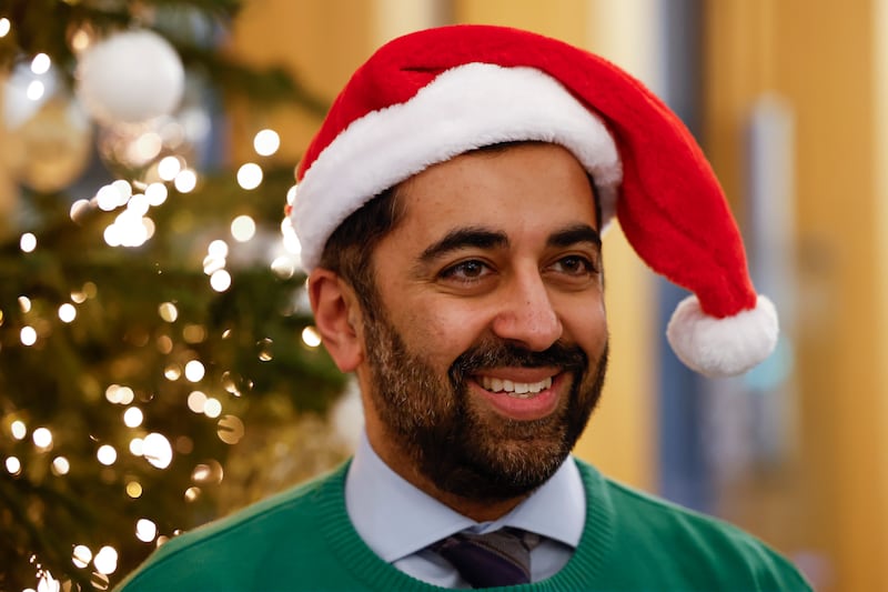 Mr Yousaf during Save the Children Christmas Jumper Day at the Scottish Parliament in December. Getty Images