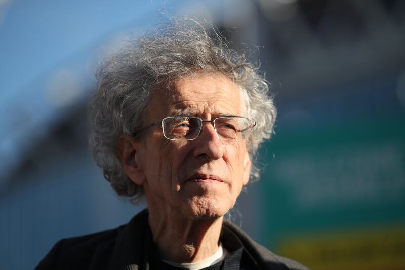 Piers Corbyn has been arrested on suspicion of encouraging people to attack MPs' offices. PA