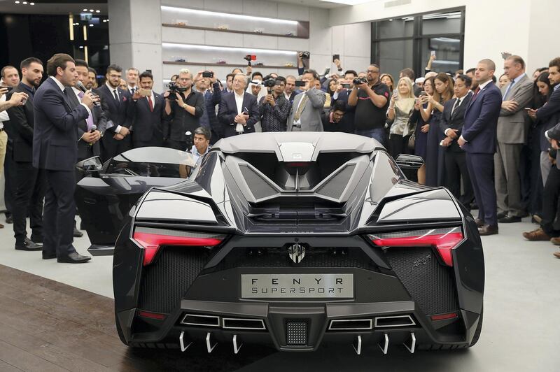 DUBAI , UNITED ARAB EMIRATES , NOV 29  – 2017 :- Ralph Debbas , CEO of W Motors ( left ) speaking about Fenyr Super Sport car during the opening of  W Motors at the City Walk 2 Boulevard in Dubai. (Pawan Singh / The National) Story by Adam Workman