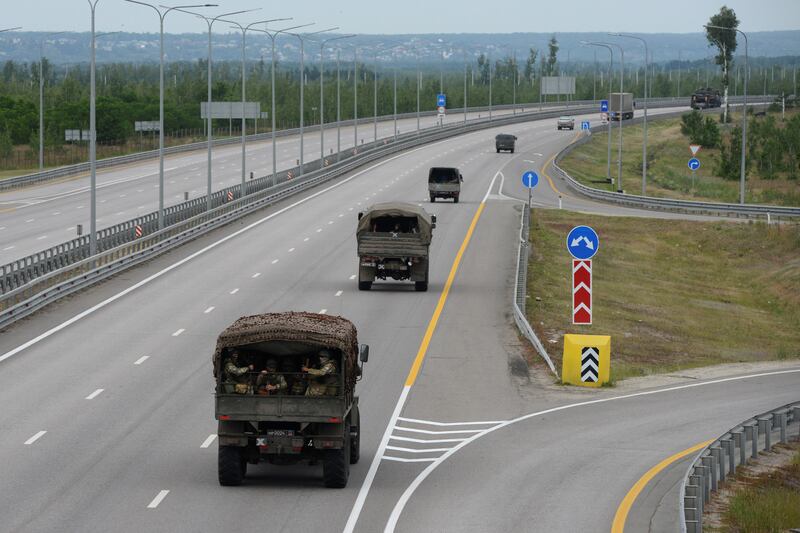 A military column of Wagner private mercenary group drives along the M-4 highway, which links the capital Moscow with Russia's southern cities, near Voronezh. Reuters