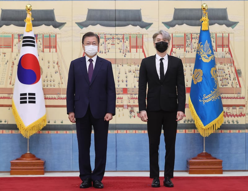 South Korean President Moon Jae-in with Suga. EPA