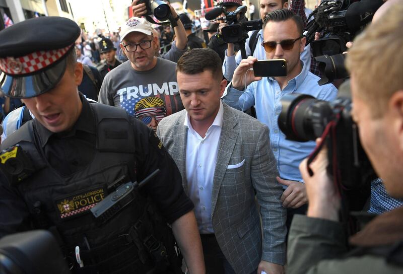 epa07697385 (FILE) - Former leader of the far-right English Defence League, Tommy Robinson (C) arrives for a court appearance at the Old Bailey in London, Britain, 04 July 2019. Media reports on 05 July 2019 state that Robinson, whose real name is Stephen Yaxley-Lennon, has been found in contempt of court for his Facebook Live broadcast of defendants in a criminal trial at the Central Criminal Court, The Old Bailey, in Central London, on 05 July 2019. He was found guilty of interfering with the trial of a sexual grooming gang at Leeds Crown Court in May 2018.  EPA/NEIL HALL