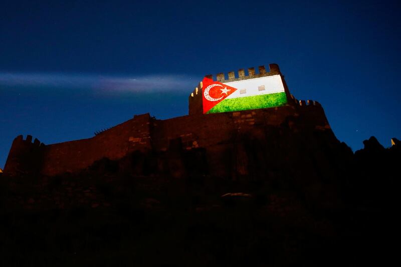 Ankara Castle is illuminated with a composite of the Turkish and Palestinian flags to show solidarity with the Palestinian people, in Ankara, Turkey. Reuters