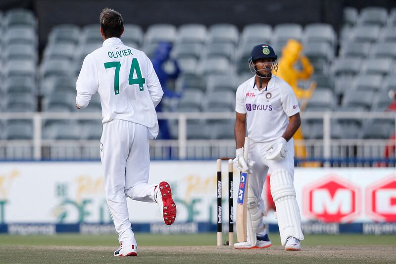South Africa bowler Duanne Olivier celebrates the dismissal of India's Mayank Agarwal. AFP
