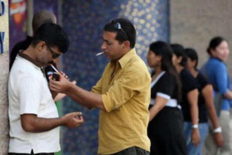 Under the new law patrons at internet cafes, billiard halls and electronic games centres will have to head outside for a cigarette.