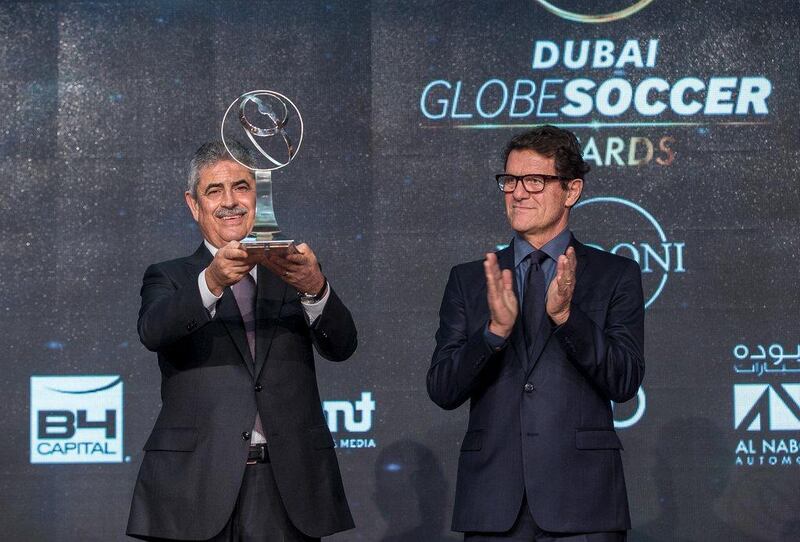 Benfica president Luis Filipe Vieira accepts the award for 'Best Academy of the Year' on Sunday at the Globe Soccer Awards in Dubai. Reuters