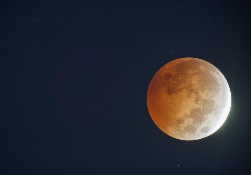 A lunar eclipse appears above Wade, North Carolina, through the lenses of an amateur astronomer's 8-inch telescope. AP 