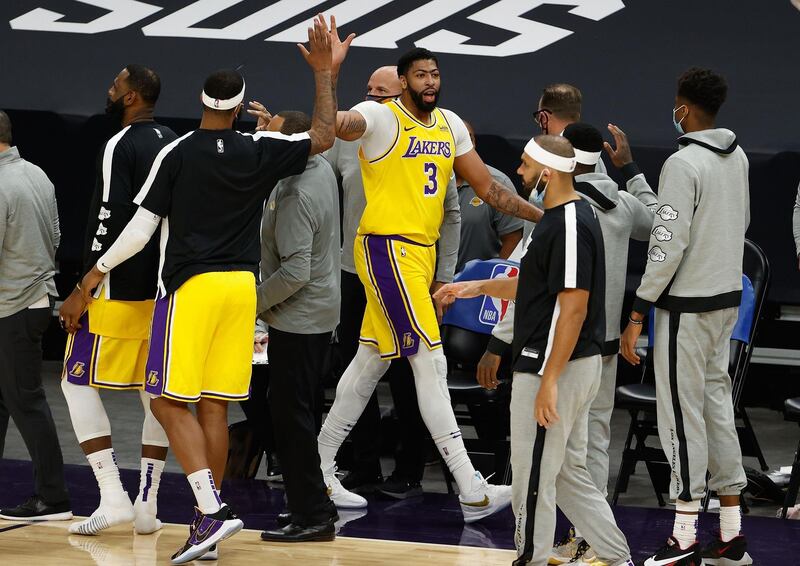 Anthony Davis of the Los Angeles Lakers high fives Markieff Morris. AFP