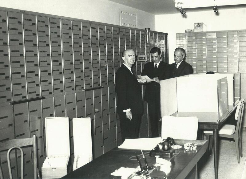 Yousuf Beidas (C) at Intra Bank headquarters in Hamra district in Beirut.