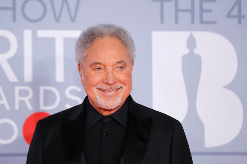 British singer Tom Jones poses on the red carpet on arrival for the BRIT Awards 2020 in London on February 18, 2020. (Photo by Tolga AKMEN / AFP) / RESTRICTED TO EDITORIAL USE – NO POSTERS – NO MERCHANDISE– NO USE IN PUBLICATIONS DEVOTED TO ARTISTS