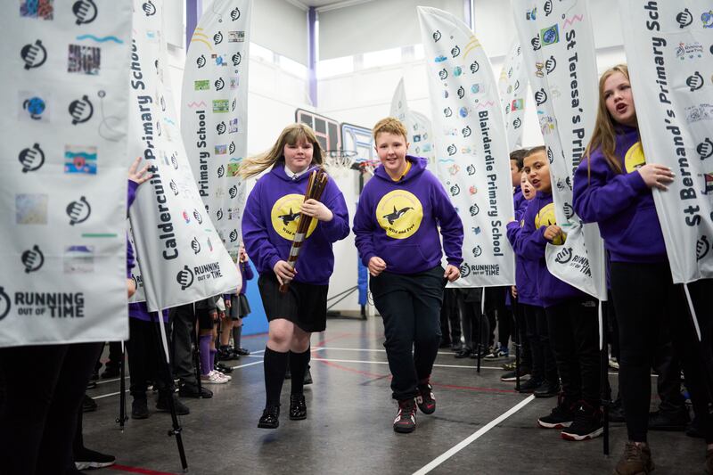 Schoolchildren in Glasgow kicked off the start of the baton relay on Sept 30. Photo: Running Out Of Time