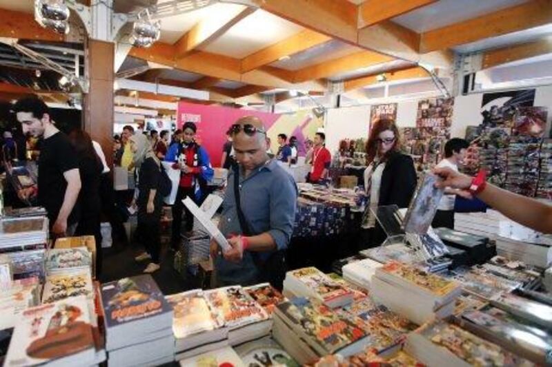 Crowds browse the huge variety of comics and books for sale at the Middle East Film and Comic Con in Dubai, April 5, 2013. Sarah Dea/The National
