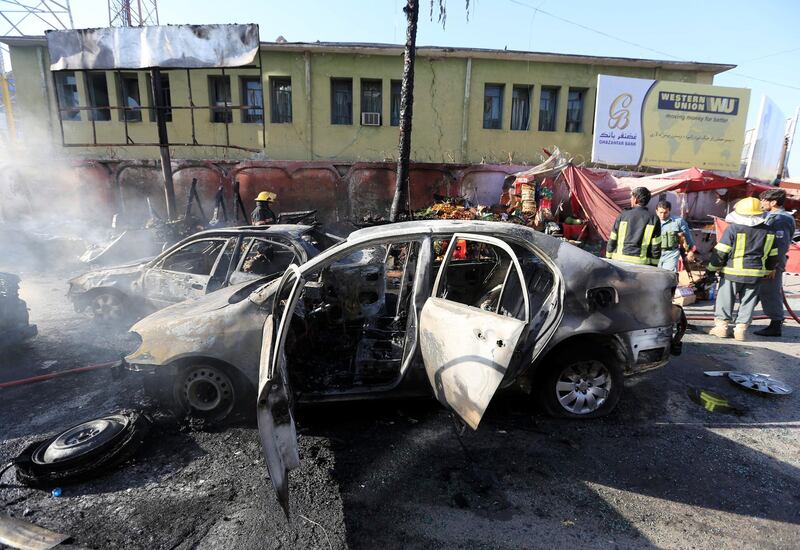 ATTENTION EDITORS - VISUAL COVERAGE OF SCENES OF INJURY OR DEATH Afghan policemen inspect the site of a blast in Jalalabad city, Afghanistan, July 1, 2018. REUTERS/Parwiz  TEMPLATE OUT