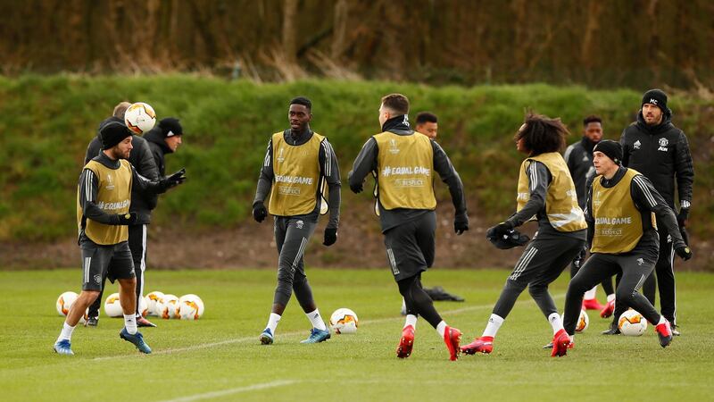 Manchester United's Juan Mata and teammates during training. Reuters