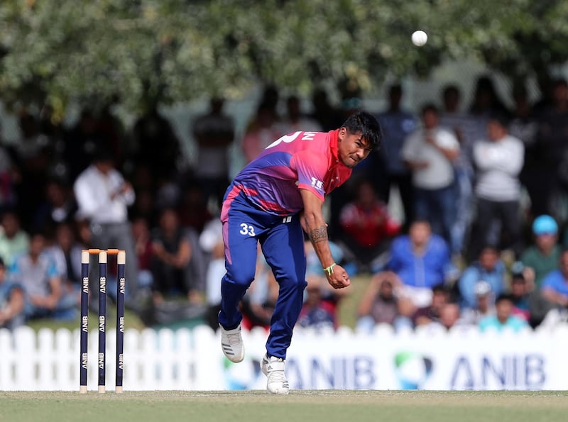 Dubai, United Arab Emirates - January 25, 2019: Karan KC of Nepal bowls in the the match between the UAE and Nepal in a one day internationl. Friday, January 25th, 2019 at ICC, Dubai. Chris Whiteoak/The National