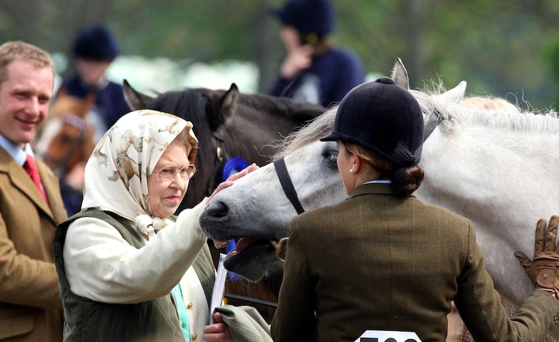 Queen Elizabeth at the Royal Horse Show in Windsor, Berkshire in May 2008. Horses, like dogs, were the queen's lifelong love and she had an incredible knowledge of breeding and bloodlines. Whether it was racing thoroughbreds or ponies, she showed an unfailing interest. PA Photo