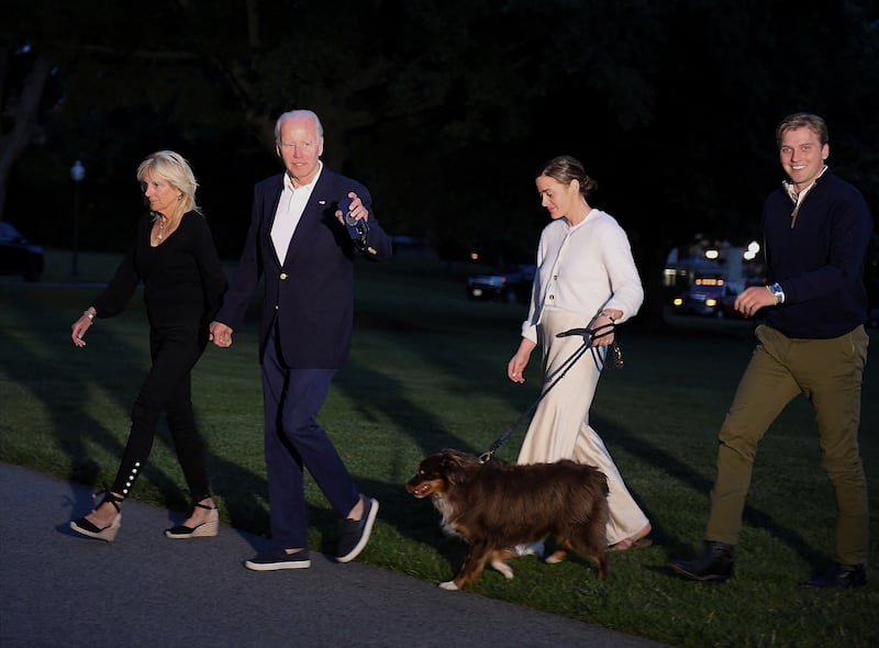 Jill, Joe and Naomi Biden and Peter Neal walk from Marine One this year. Reuters