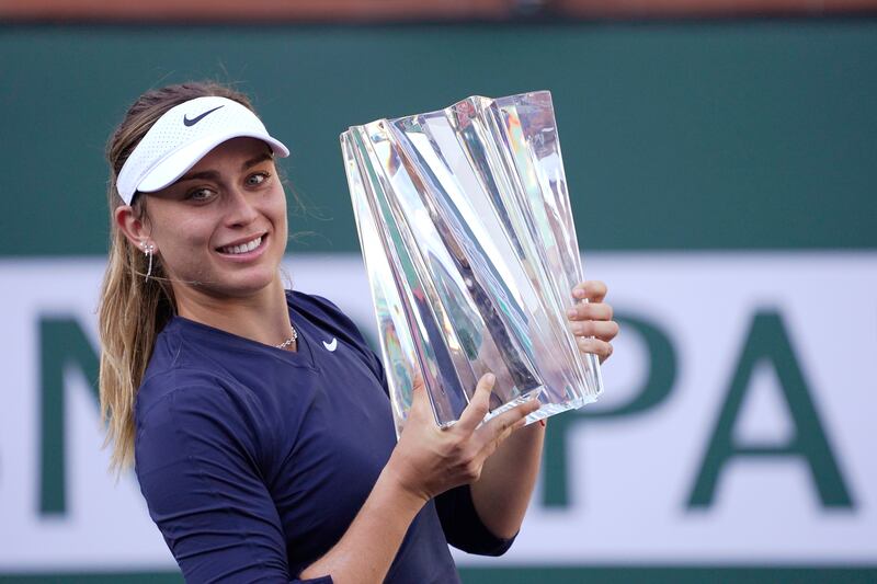 Paula Badosa, of Spain, holds up her trophy after defeating Victoria Azarenka, of Belarus. AP Photo