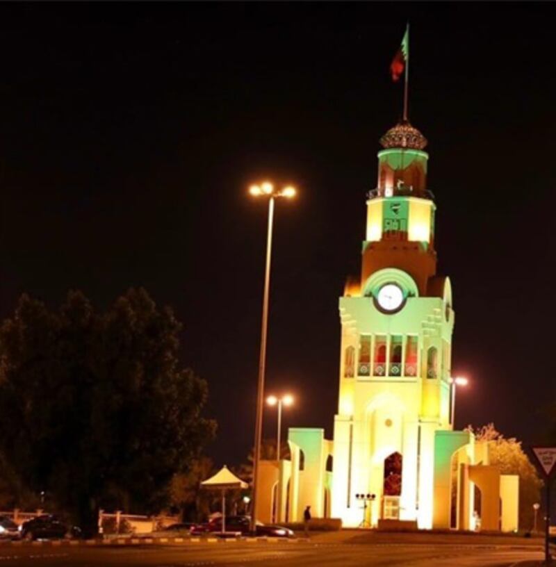 The clock tower in Riffa turned green and white.