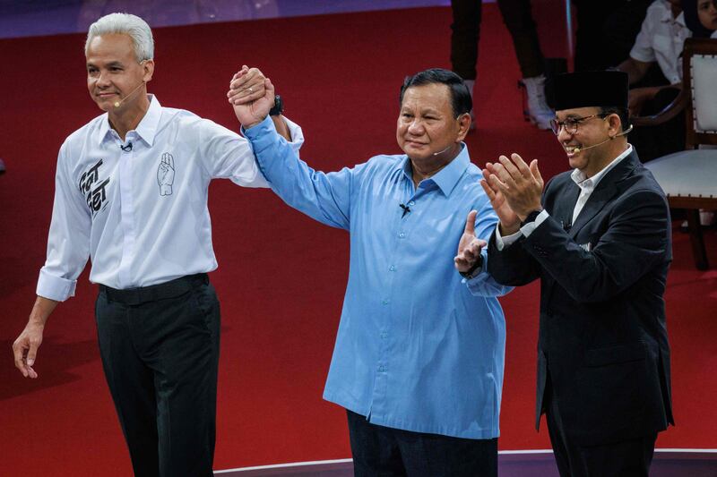 Indonesian presidential candidates, from left, Ganjar Pranowo, Prabowo Subianto and Anies Baswedan, after the first presidential election debate in Jakarta in December. AFP