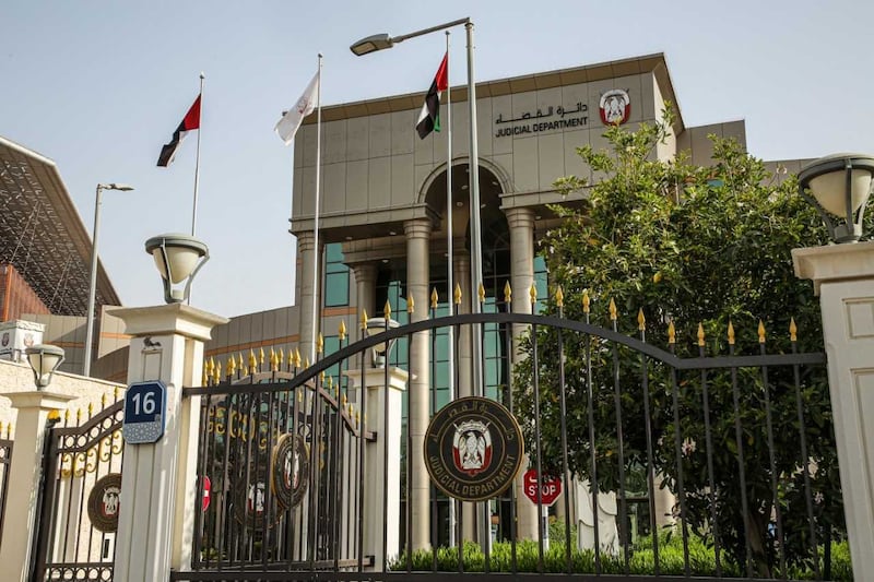 The court sentenced four defendants in person, and the other nine defendants in their absence. Photo: Abu Dhabi Judicial Department