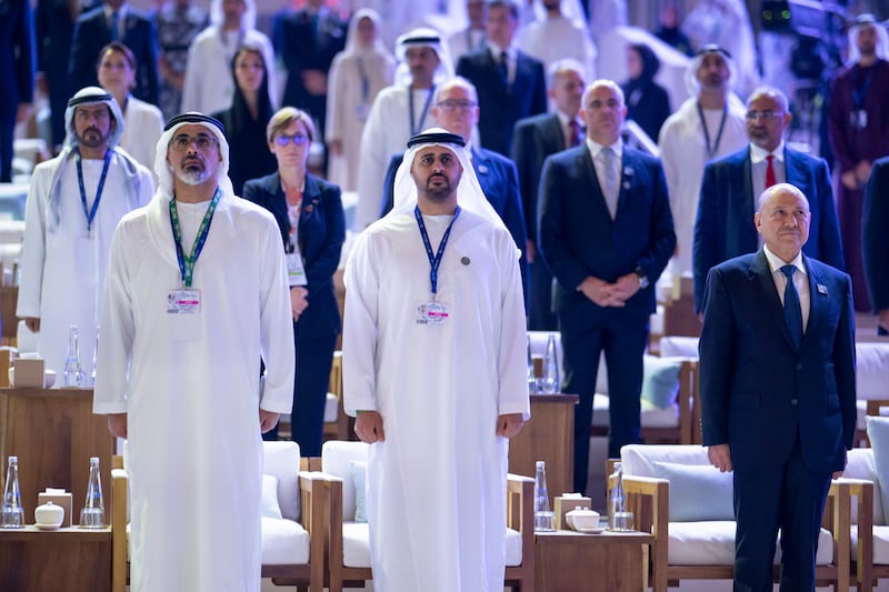 Crown Prince of Abu Dhabi Sheikh Khaled bin Mohamed, Sheikh Theyab bin Mohamed, Chairman of the Office of Development and Martyrs Families Affairs at the Presidential Court during the national anthem during the Zayed Sustainability Prize for Climate Action. 