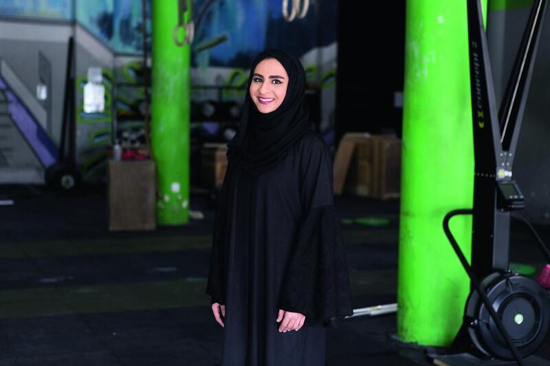 Abeer Al Khaja, co-founder of Ana Gow Running Club in Dubai and a CrossFit level-two trainer. Reem Mohammed / The National