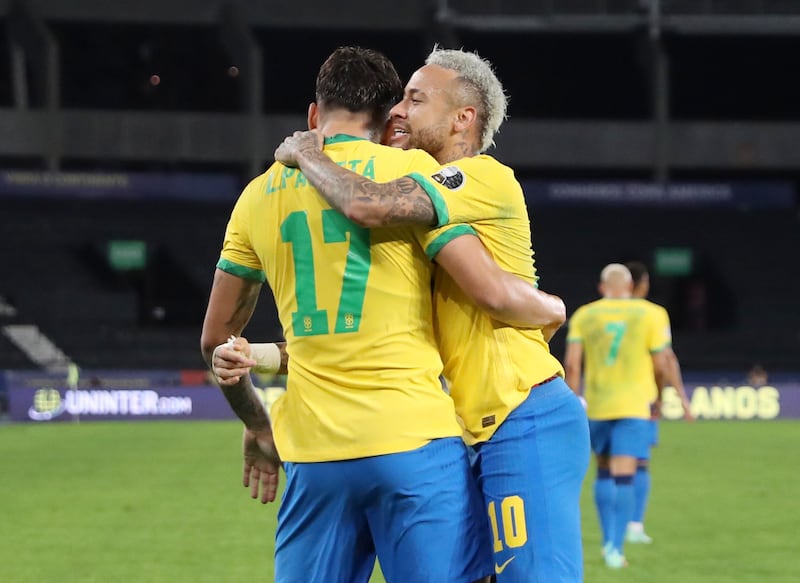 Lucas Paqueta celebrates scoring their first goal with Neymar.