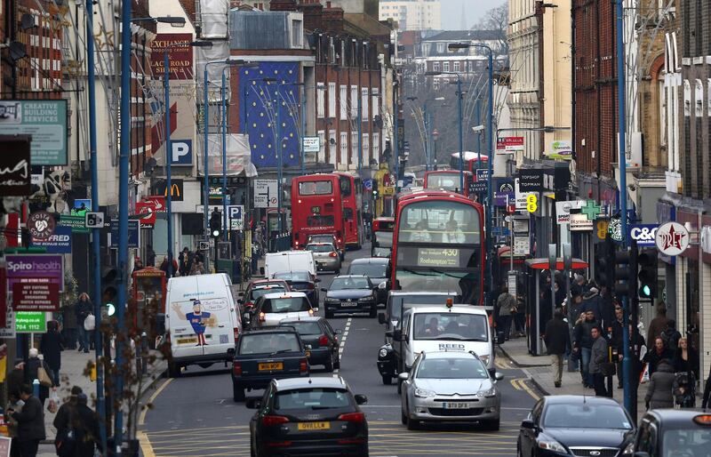 PUTNEY, ENGLAND - JANUARY 10:  Traffic fills Putney High Street on January 10, 2013 in Putney, England. Local media are reporting environmental campaigners claims that levels of traffic pollutants, mostly nitrogen dioxide, have breached upper safe limits in the busy street in south west London.  (Photo by Peter Macdiarmid/Getty Images)