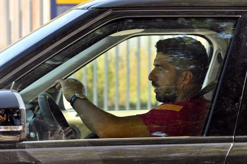 Barcelona's Uruguayan forward Luis Suarez leaves the Joan Gamper Ciutat Esportiva after training. AFP