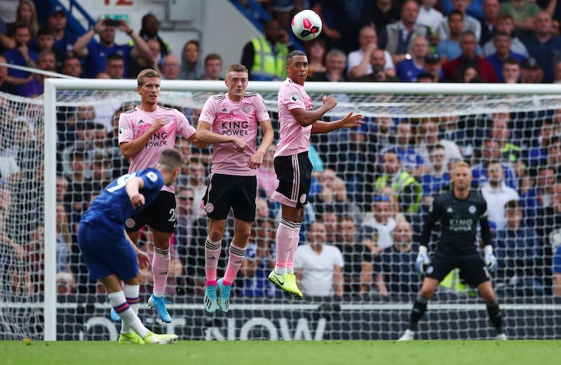 Leicester's Dennis Praet, Jamie Vardy and Youri Tielemans attempt to block a free kick from Chelsea's Mount.  Reuters