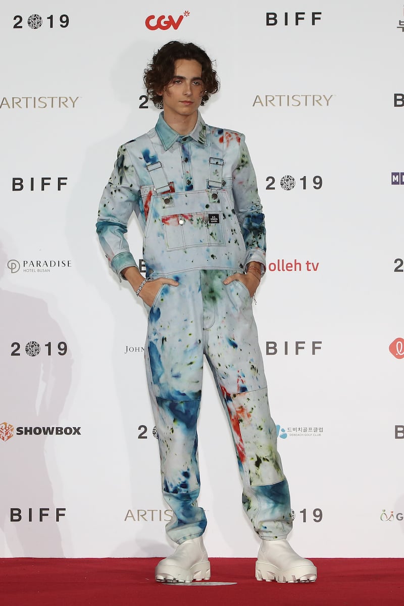 Wearing SR Studio LA CA, the actor attends a photocall in October 2019 for 'The King' at the 24th Busan International Film Festival in South Korea. Getty Images